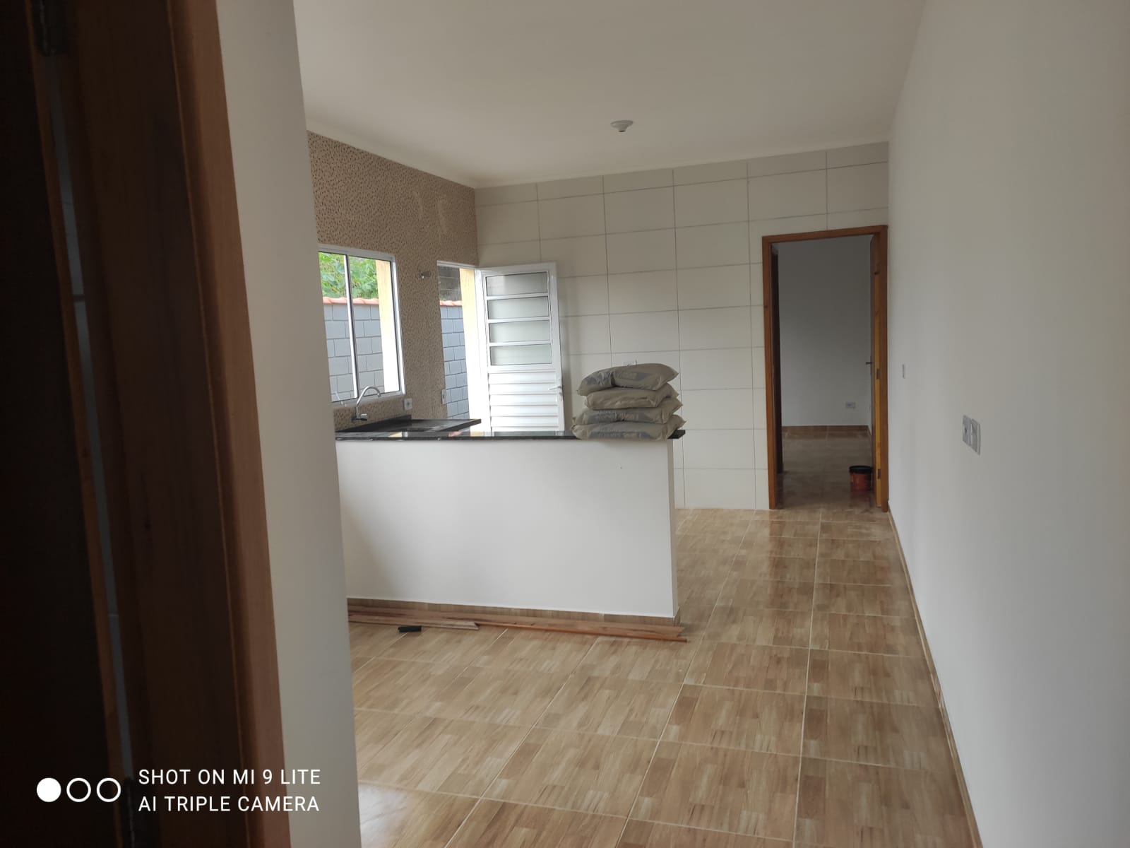 CASA NO BAIRRO NOVA ITANHAÉM - LADO MORRO A 1800 METROS DA PISTA - ITANHAÉM/SP - foto 6